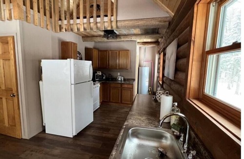 Newberry Cabin | True North - Cozy log cabin in the woods off the grid near Tahquamenon Falls