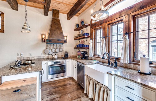 Eufaula Cottage | Tuscan feel with outdoor fireplace and cooking.