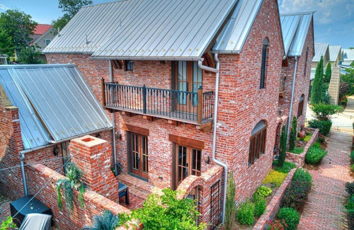 Eufaula Cottage | Tuscan feel with outdoor fireplace and cooking.