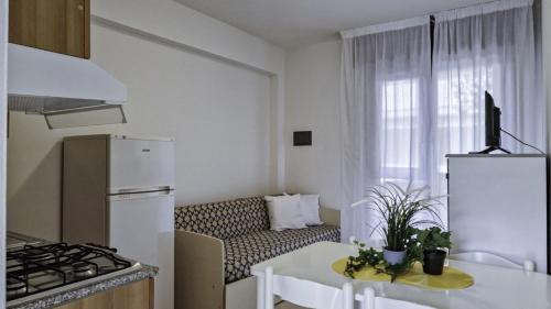 Bibione Pineda Apartment | Two-room flat with swimming pool near the sea