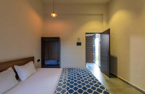 Karjat Villa | Two Villa by StayVista with Infinity Pool, Farm & Mountain Views, Modern Interiors