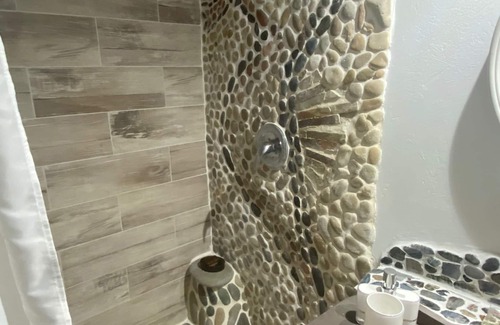 Robins Bay Apartment | Unique mosaic 2-b/r eco-friendly open concept space-WiFi, seawater pool, BBQ