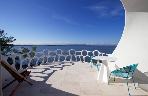 Cocoplum Apartment | Unique waterfront studio with AC, pool, bikes, & kayaks