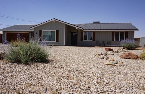Page House | Unleash Your Inner Explorer: The Dam Dino House!