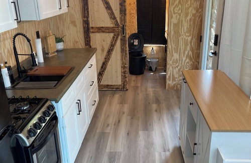 Odessa Cabin | Unplug and unwind in this charming loft cabin nestled on the water’s edge.