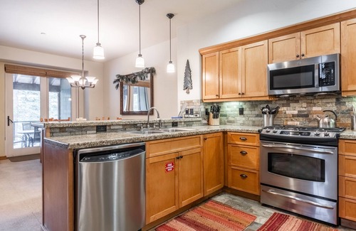 Woodwinds House | Upscale 4 Bed, 3 Bath at the Woodwinds with Mountain Views, Private Hot Tub, and Garage sleeps 10