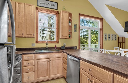 Elkhart Lake Villa | Upscale Waterfront and Pool View Condo!