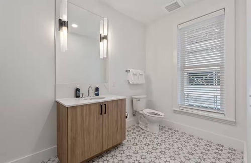 Main - Military Plaza Hotel | Urban Elegance—Steps from River Walk | In-Unit Laundry & Kitchen