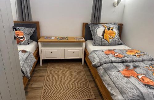 Komlo Apartment | VándorLÓ Vendégház