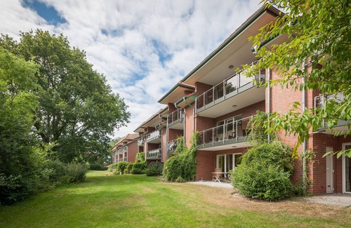 Wremen Apartment | Vacation apartment Nordseebrise. Inviting and with balcony.