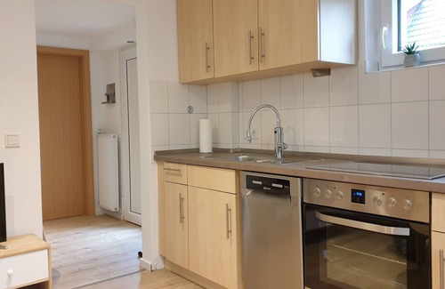 Nordseebad Burhave Apartment | Vacation apartment Meermuschel in Burhave for 2-4 pers. with garden and barbecue by the sea