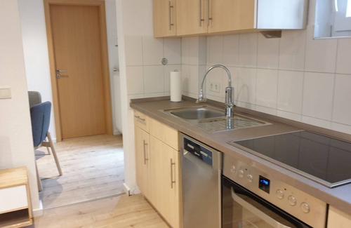 Nordseebad Burhave Apartment | Vacation apartment Meermuschel in Burhave for 2-4 pers. with garden and barbecue by the sea