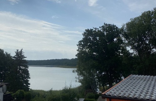 Murchin House | Vacation apartment/vacation bungalow/vacation home with lake view off Usedom