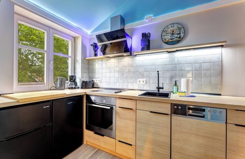 Ueckeritz Apartment | Vacation apartment with private sauna and fireplace, right on the beach.