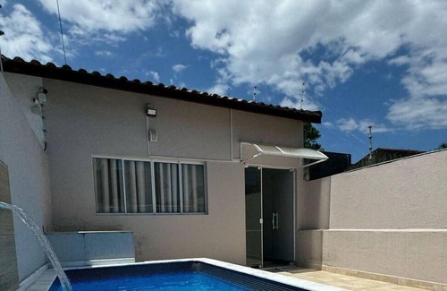 Raul Cury House | Vacation home in Itanhaém, a few minutes from the beach, with swimming pool and parking
