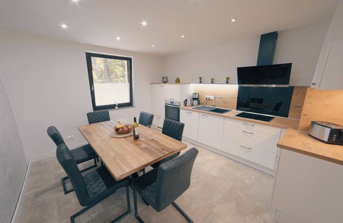 Guestrow House | Vacation home "Mien Huus an See" with lake access, jetty and bathing facilities