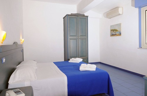 Province of Messina House | Vacation Home "Oasi Azzurra - Bilocale Standard-103" with Shared Pool & 2 Shared Terraces