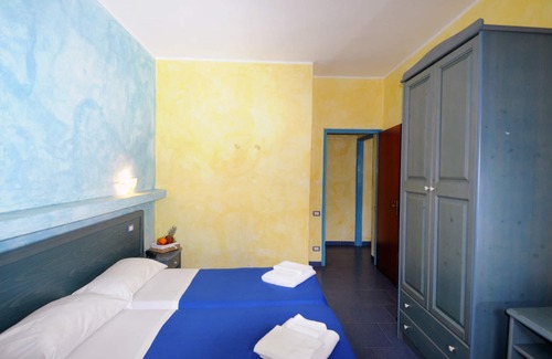 Province of Messina House | Vacation Home "Oasi Azzurra - Bilocale Standard-103" with Shared Pool & 2 Shared Terraces