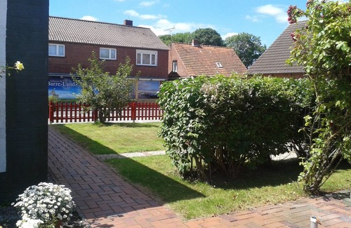 Westeraccumersiel Cabin | Vacation in a rustic vacation log cabin with flair - new shower room, beach approx. 1 km