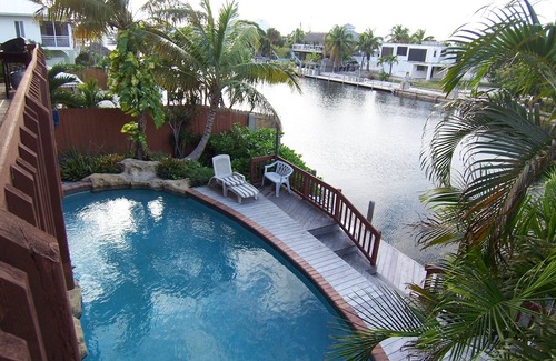 Venetian Shores House | Venetian Shores Escape! Heated Pool, 3BR, 70ft Dock, Dog-Friendly!