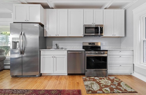 Ogdensburg House | Victorian 2 bedroom 1.5 bath townhome screened porch, view of St. Lawrence River