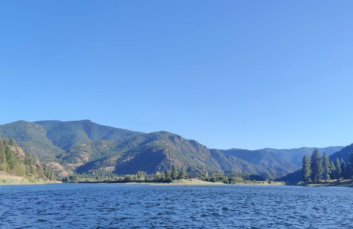 Glacier Country Cabin | Victorian Dream, glamping by the river, 2 miles from Quinn's Hot Springs Resort.
