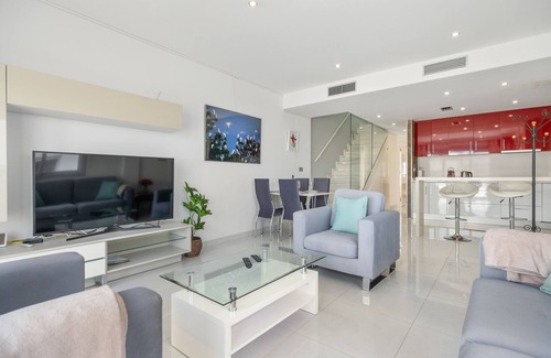 Orihuela Costa Villa | Villa Bahati close to the Beach with Sea View, Shared Pool, Garden, A/C & Wi-Fi