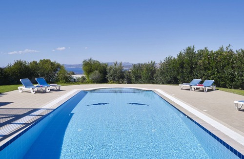 Pefkos Villa | Villa for six. Large pool, sea views, lawned gardens. Near beach and amenities.