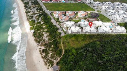 Ingleses do Rio Vermelho Apartment | Villa Giardino - Condomínio de Frente para o Mar - Piscina, Quadra Esportiva, Churrasqueira - 5 Pessoas