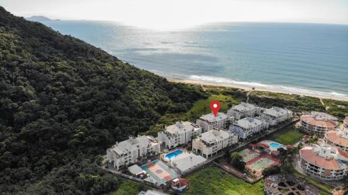 Ingleses do Rio Vermelho Apartment | Villa Giardino - Condomínio de Frente para o Mar - Piscina, Quadra Esportiva, Churrasqueira - 5 Pessoas