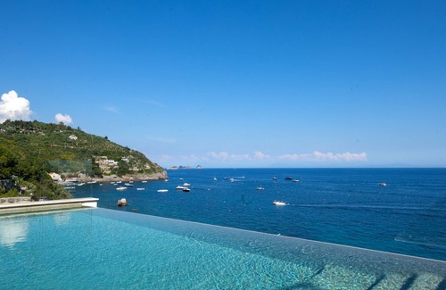 Marina del Cantone Villa | Villa Ibiscus with Infinity Pool, Direct Sea Access, Sea View,