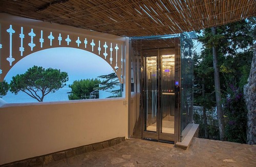 Marina del Cantone Villa | Villa Ibiscus with Infinity Pool, Direct Sea Access, Sea View,