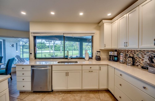 Lochmoor Waterway Estates Villa | Villa Journey - newly renovated, large pool, adjoining small park with lake