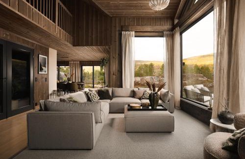 Kviteseid Ski Chalet | Villa Lakehouse Moss with sauna, boat & jacuzzi