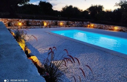 Fumarola Villa | Villa on an elevated terraced olive grove with views over the Valley of Itria.
