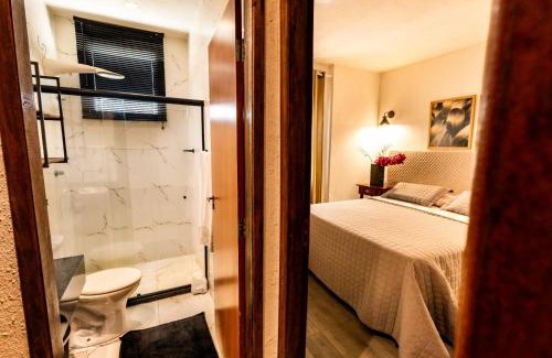 Itapua Apartment | Villa Romana - Experiência única em frente à Praia de Itapuã, apartamento todo climatizado