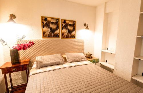 Itapua Apartment | Villa Romana - Experiência única em frente à Praia de Itapuã, apartamento todo climatizado