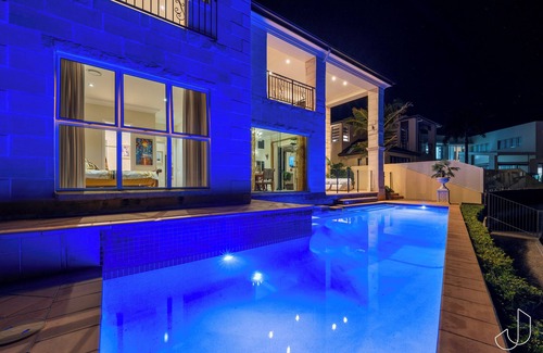 Paradise Point House | Villa Royal is a luxurious waterfront mansion. with Jetty. direct ocean access.