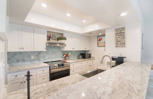 Litchfield by the Sea Condo | Villa with landscape view and pool access located within gated Litchfield By the Sea community.