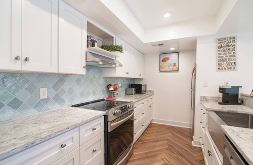 Litchfield by the Sea Condo | Villa with landscape view and pool access located within gated Litchfield By the Sea community.