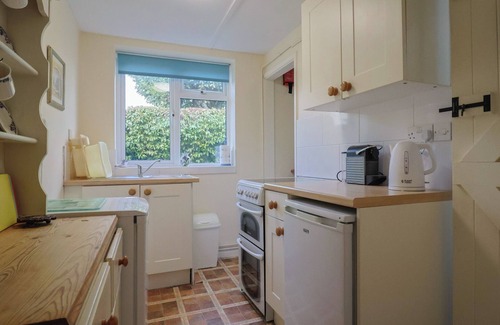 Bridport Cottage | VINE COTTAGE, pet friendly, with a garden in Burton Bradstock