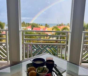 Bas du Fort Apartment | Vue mer et montagne, piscine, proche de la plage avec citerne d eau et parking