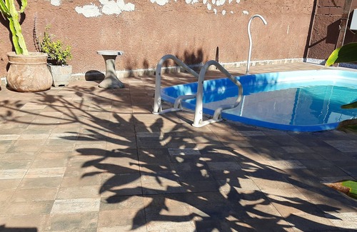 Jaboticabal House | Waking up to the birds chirping