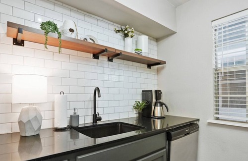 Allandale Apartment | Walk to Restaurants or Cook in Subway Tile Kitchen