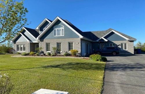 Tracadie House | Water front property,stunning sunset views, with your own indoor swimming pool.
