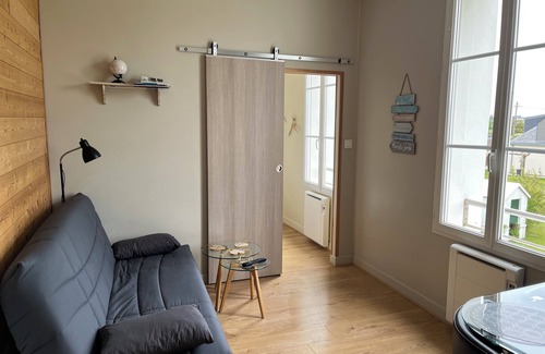 Langrune-sur-Mer Apartment | Waterfront apartment with your feet in the water!