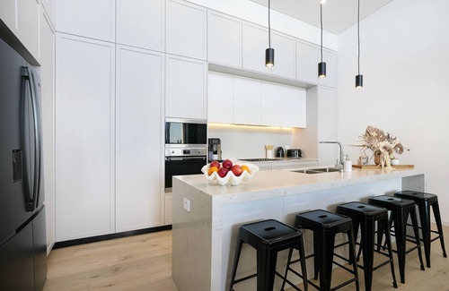 Shell Cove Apartment | Waterfront Coastal Marina Apartment on waters edge!