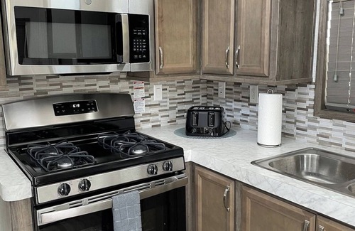 Bridgewater Cottage | Waterfront Glamping Escape — Cozy Floating Cottages on the Peaceful Beaver River