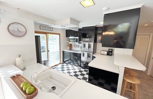 Summersea House | Waterfront home with private boat dock, heated pool, kayaks, A/C, and more