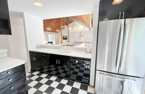 Summersea House | Waterfront home with private boat dock, heated pool, kayaks, A/C, and more